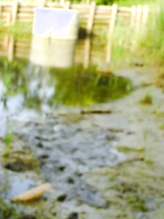 Moormann im nackt im Schlamm